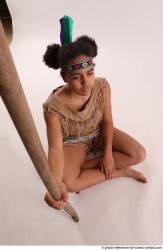 ANISE SITTING POSE WITH SPEAR